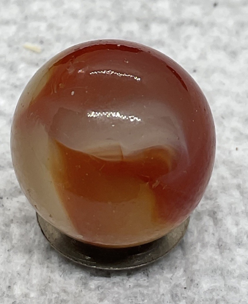 A Vintage Akro Agate Carnelian UV Marble. It Measures .70”, Near Mint Condition