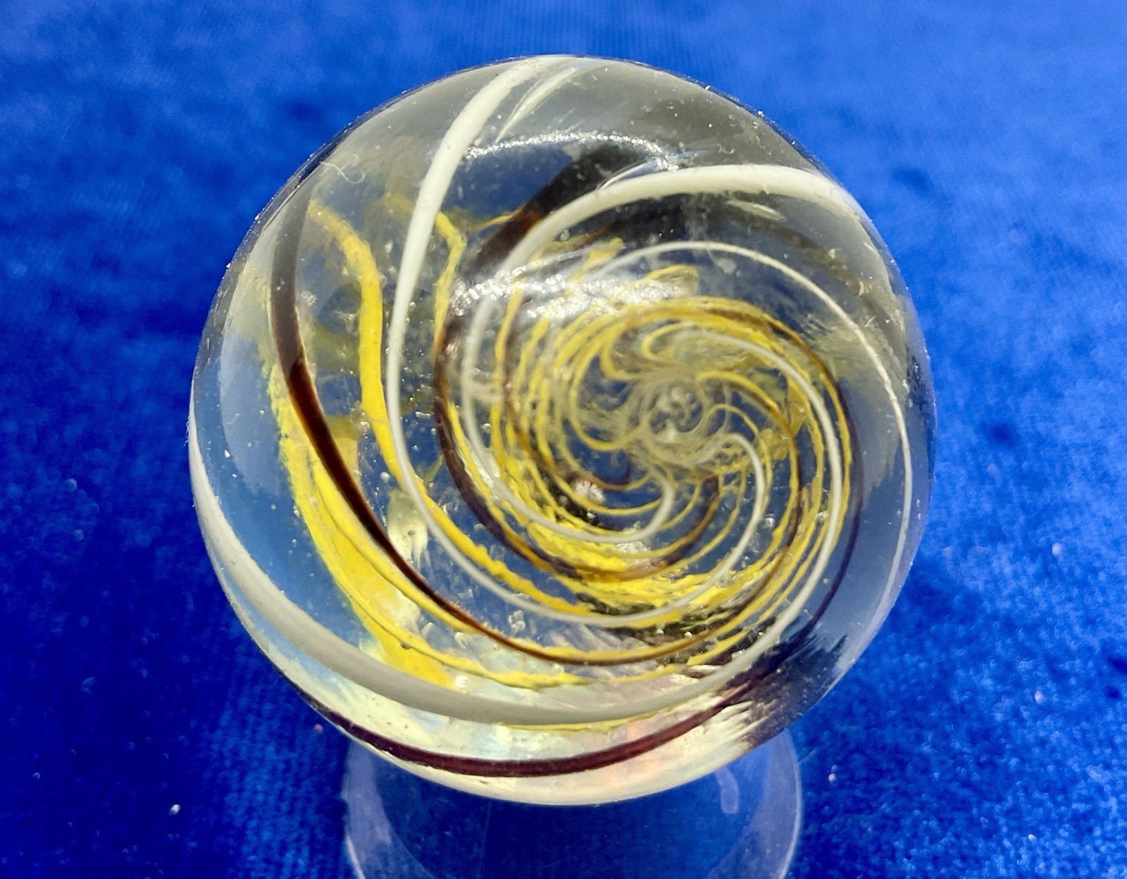 A vintage German Handmade Yellow Latticinio Marble. Measures 1.59 “ Near Mint.