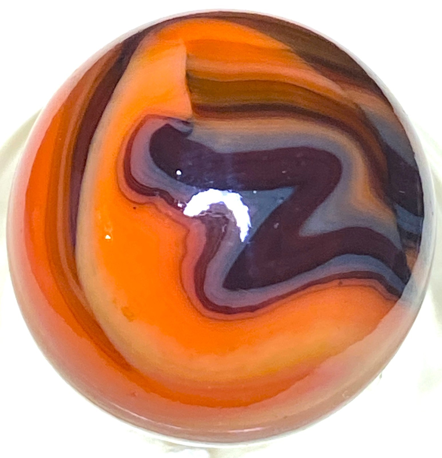 VERY DARK OXBLOOD AND CONTRASY ORANGE SWIRLED SHOOTER .73″ BOX03/121