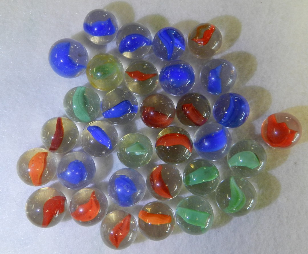 #20944m Vintage Group or Lot of 30 Peltier Glass Banana Cat’s Eye Marbles