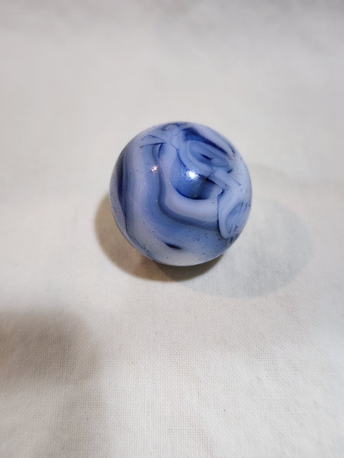 Christensen Agate Company (CAC) Swirl Marble with a blue and white swirl pattern