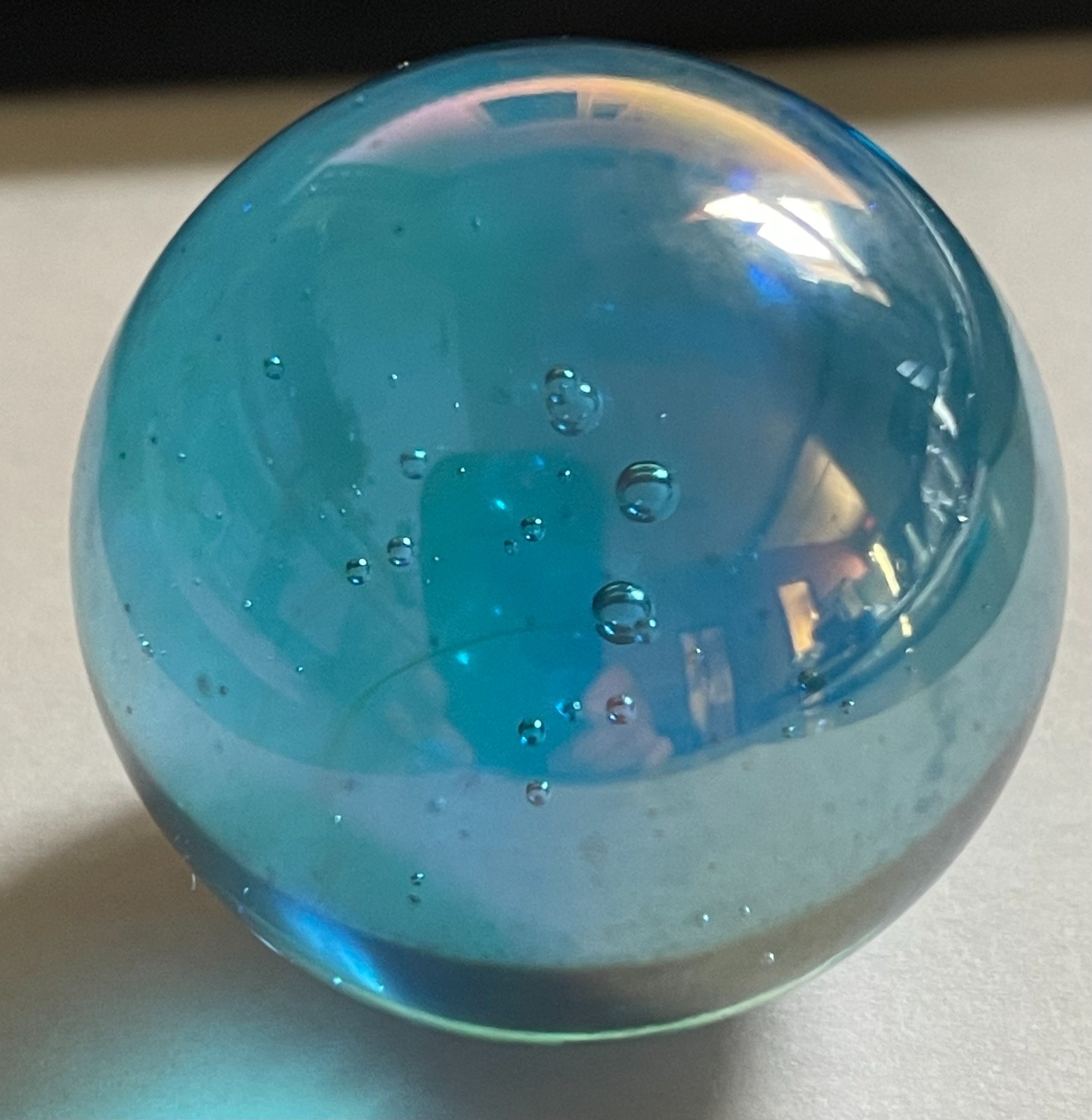 Oily Lt Blue Glass Mammoth Marble, Iridescent light blue, 1.5″