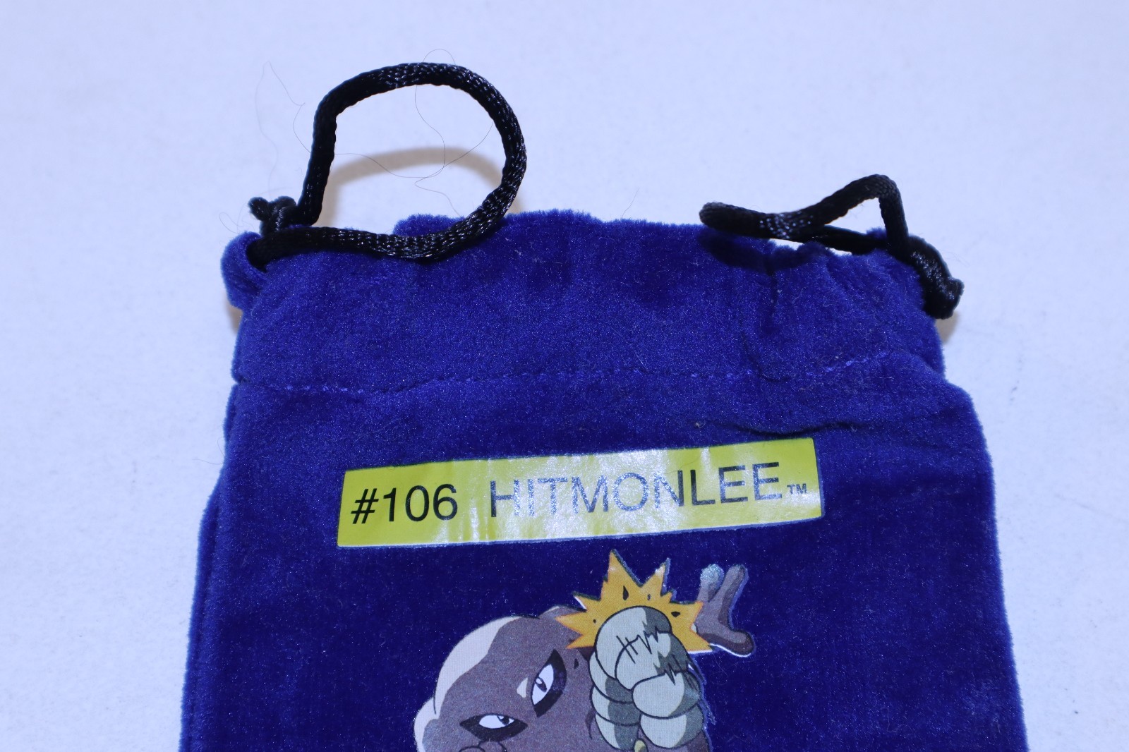 2 Pokémon Collectible Marbles #85 Doorie & #116 Horsea & Pouch #106 Hitmonlee
