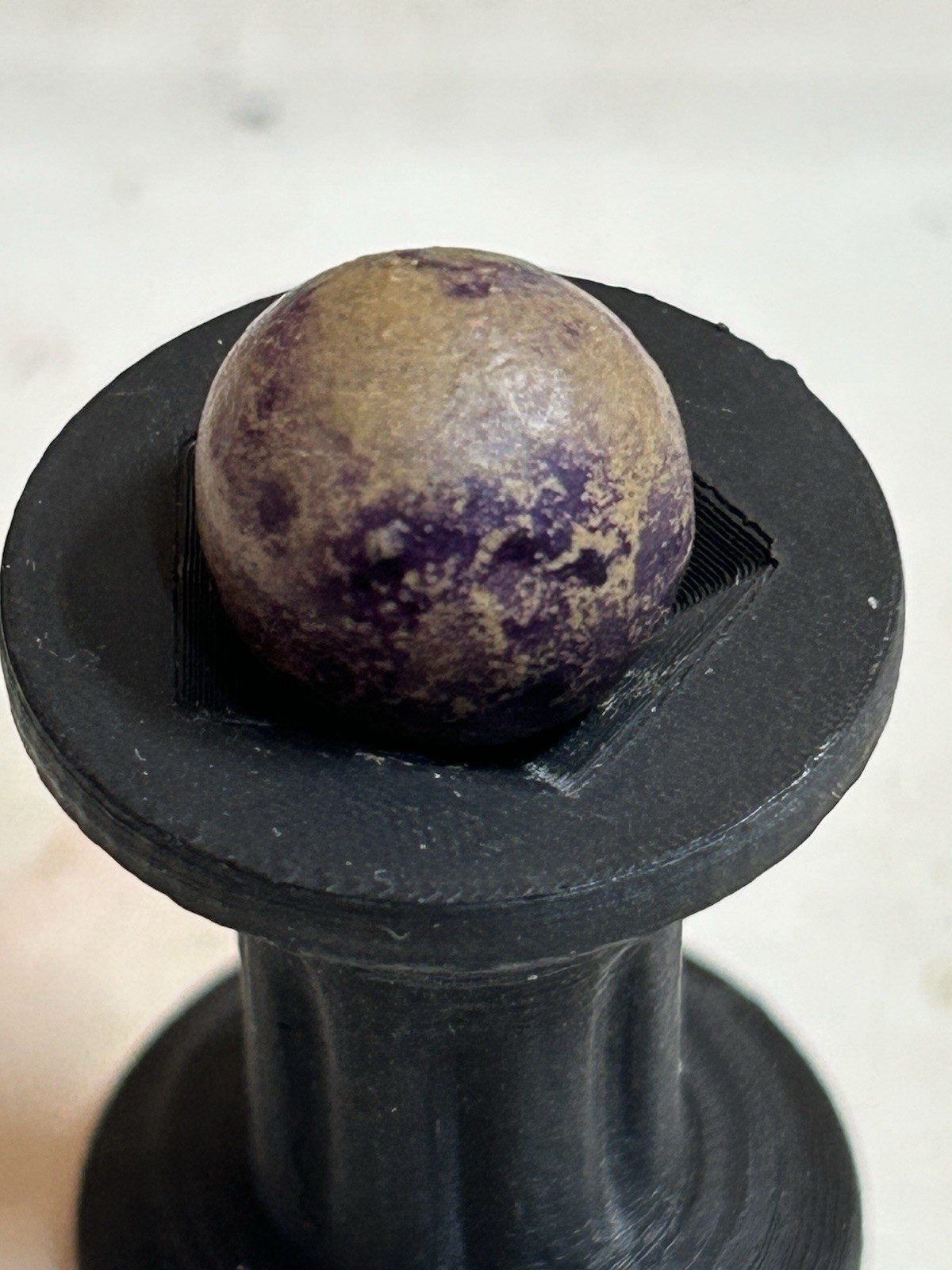 Antique American Marble and Toy Company Mottled Purple Dyed .51 Inch Clay Marble