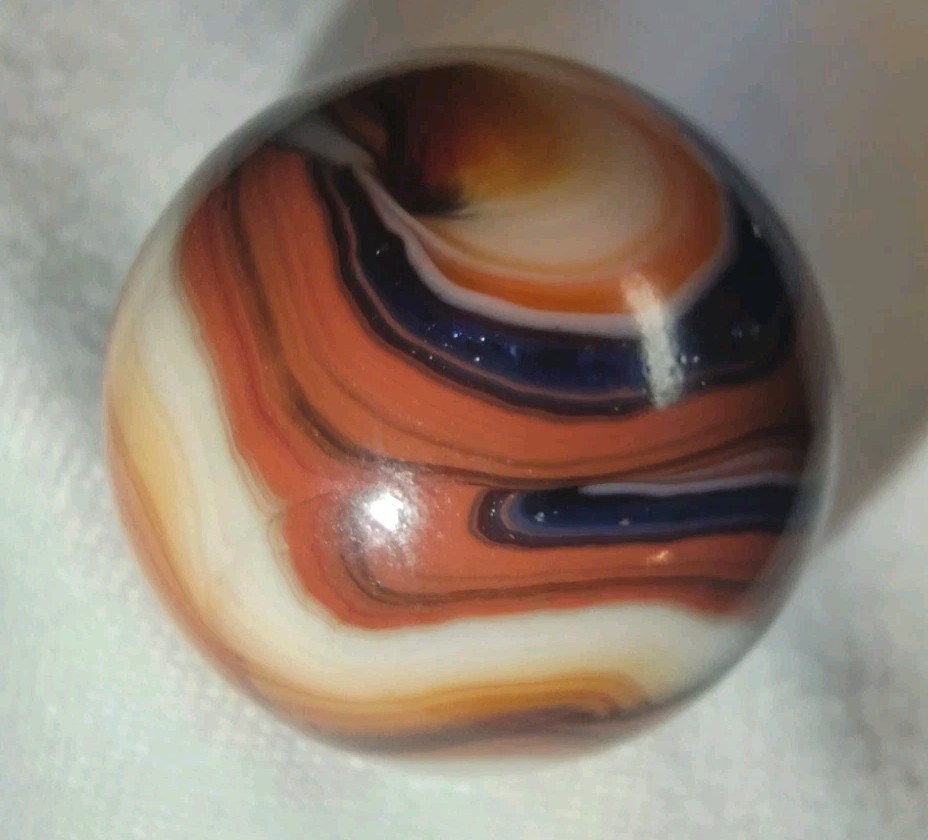 Jabo/DAS Cranberry Busy Gorgeous Flame Swirl Shooter Marble .74 Out Of Round