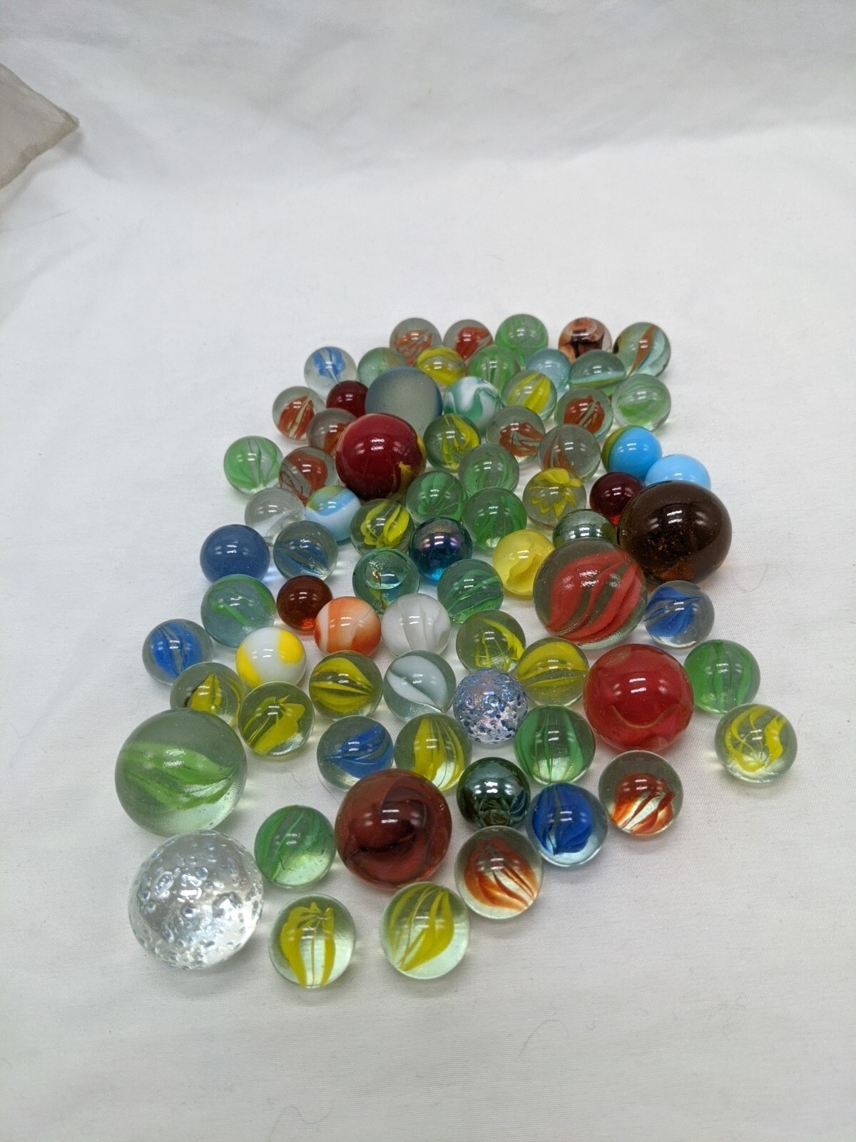 Bag Of (73) Glass Clear Swirl Colored Marbles