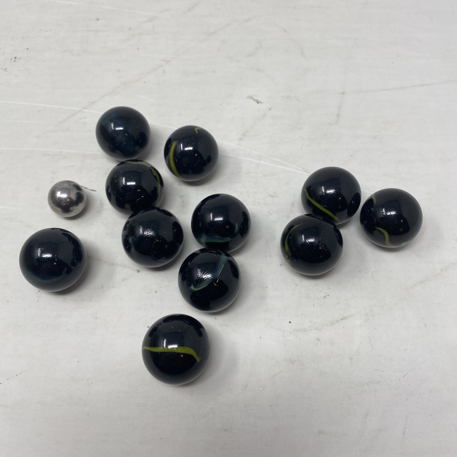 Lot Of 11 Vintage Marbles Black With Green/Yellow Color Swirl