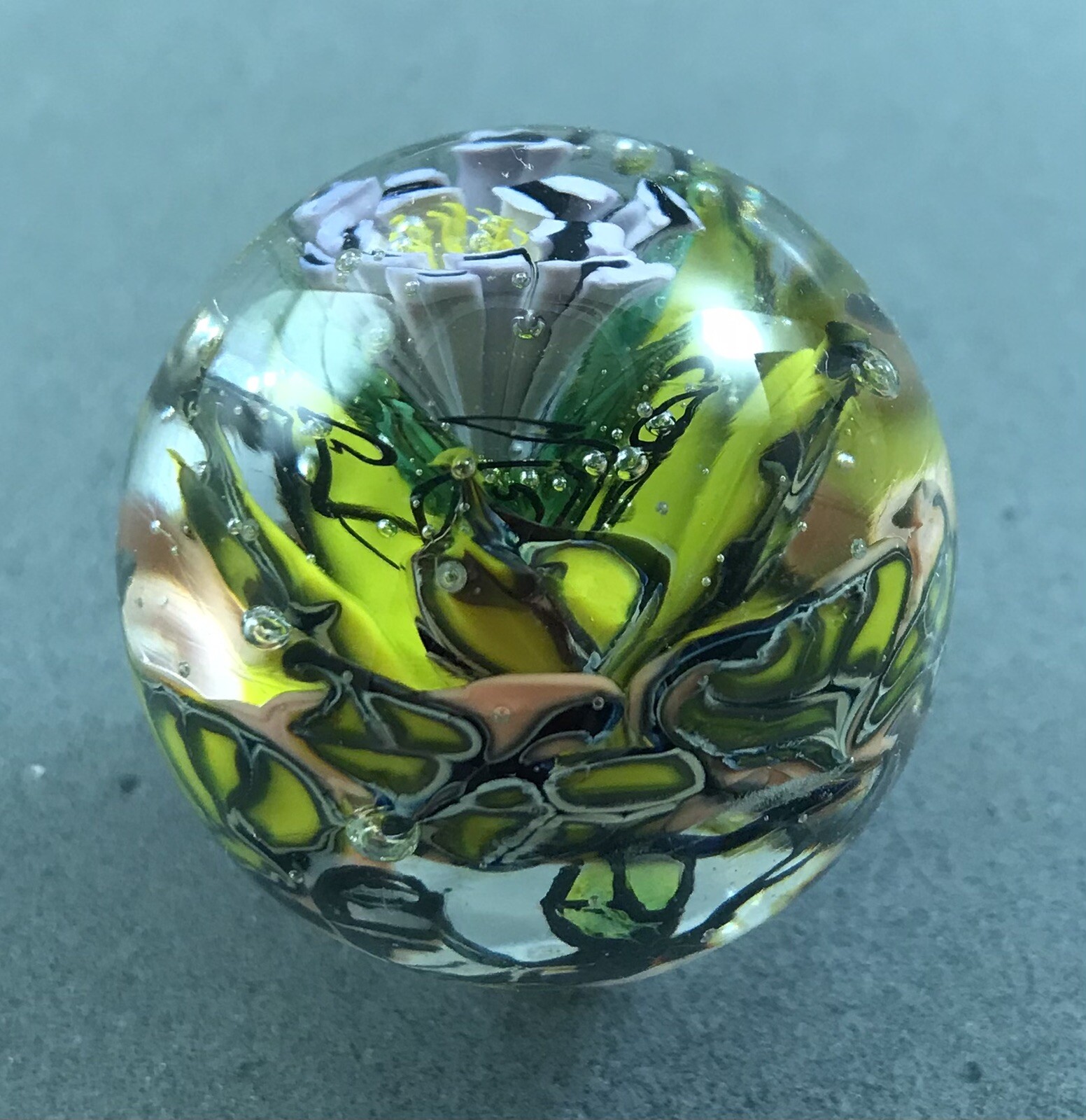 handmade 1 3/4” Purple Murrini Floral glass marble W/ Hand Painted Bug