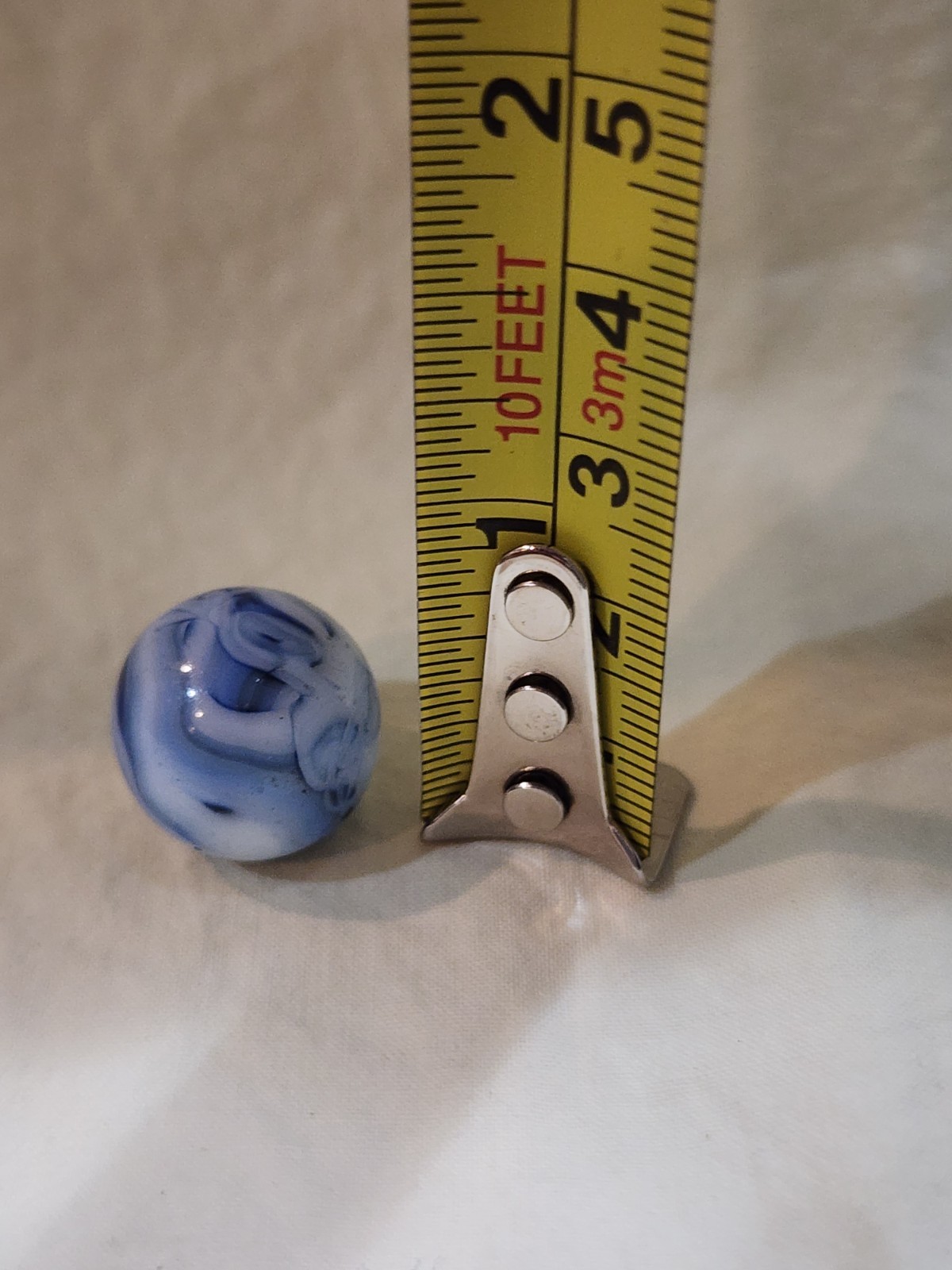 Christensen Agate Company (CAC) Swirl Marble with a blue and white swirl pattern
