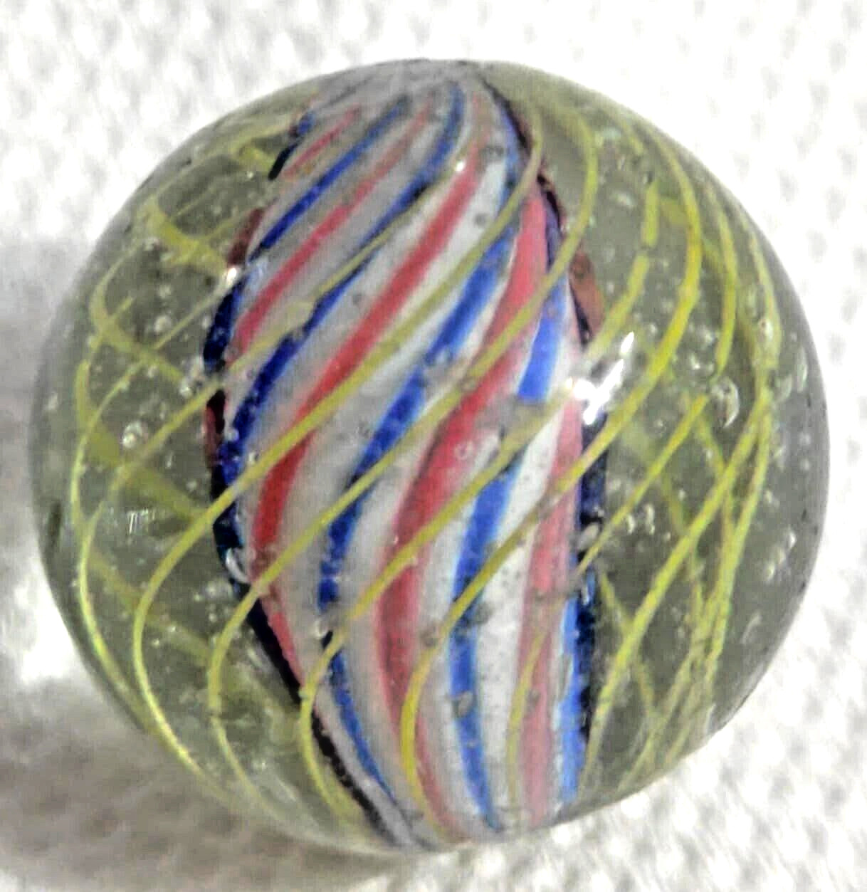 OLD 2 TOY MARBLES multi colored solid core caged 1 tri level ,2 blue base glass