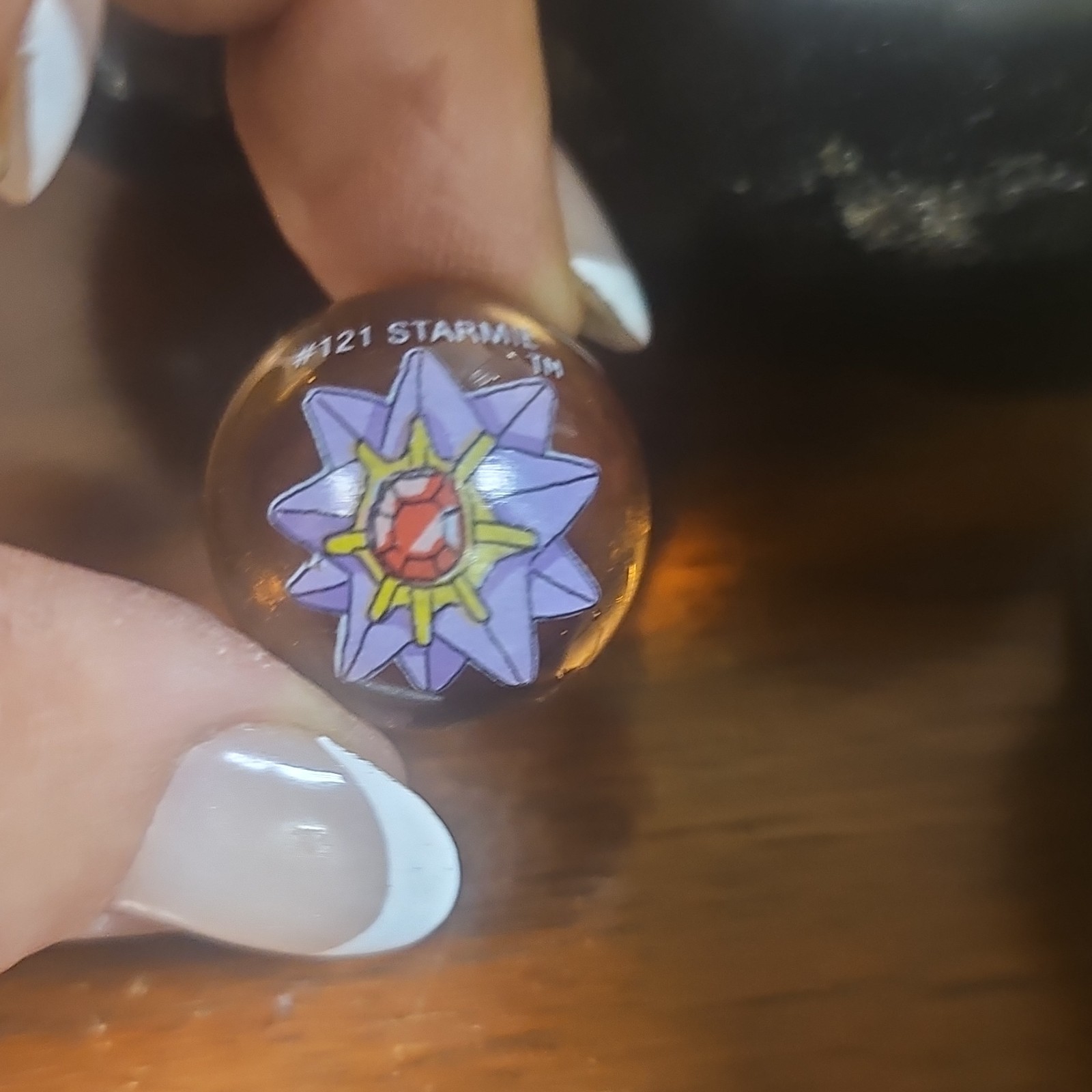 Starmie #121 Glass Toy Marble, Machine Made, 1998 Nintendo Character Print