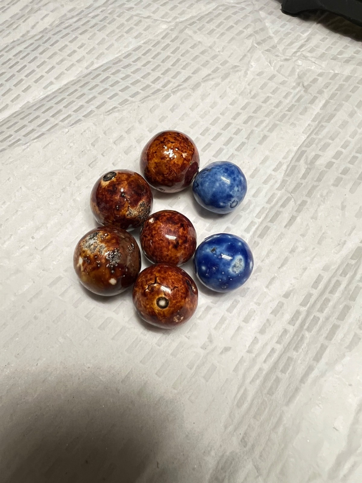 lot of seven bennington marbles, 3 are 1/2 i ch others are smaller 4 brown two b