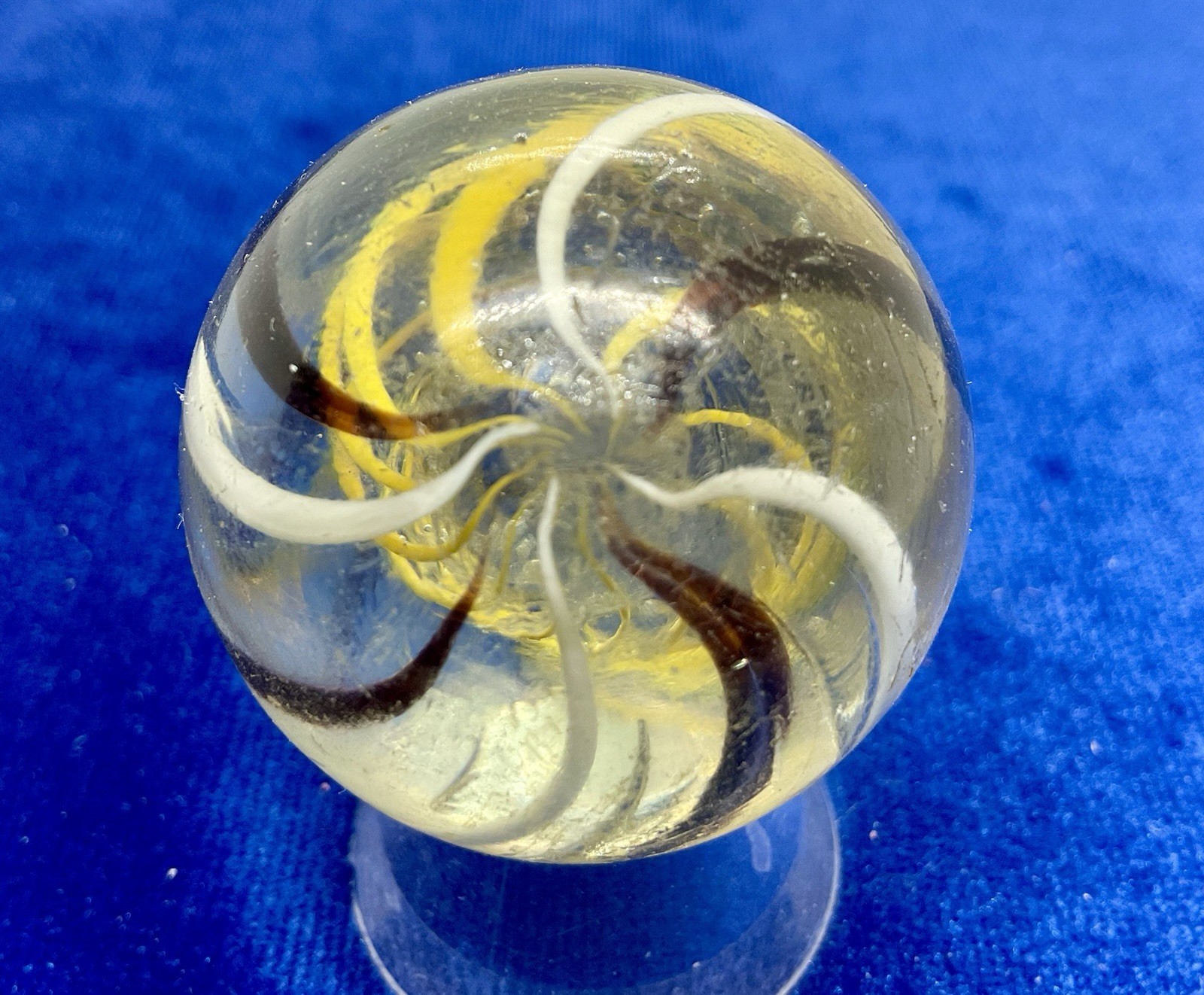 A vintage German Handmade Yellow Latticinio Marble. Measures 1.59 “ Near Mint.