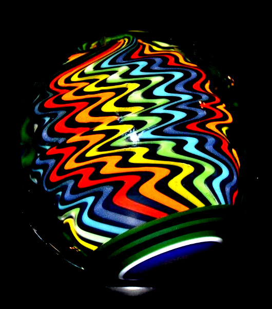 JOSHUA JUSTICE GLASS MARBLE/1.728″-DARK RAINBOW UV-NEON GREEN UNDER BLACKLIGHT