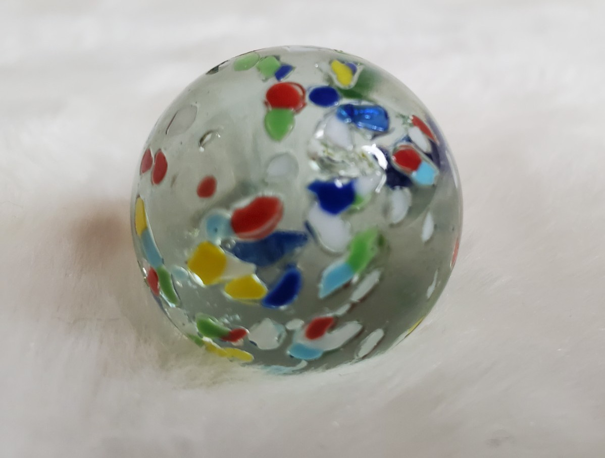 1″ Vintage confetti shooter marble – clear glass w/ multi colors on surface