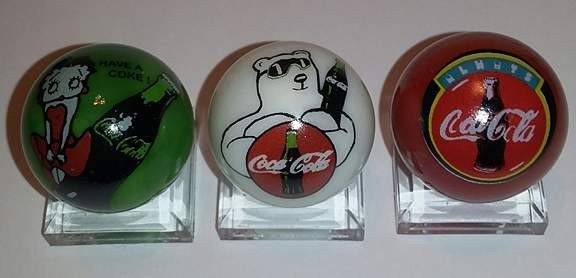 Set of 3 Coke Glass 1″ Logo Marbles w/ Stands
