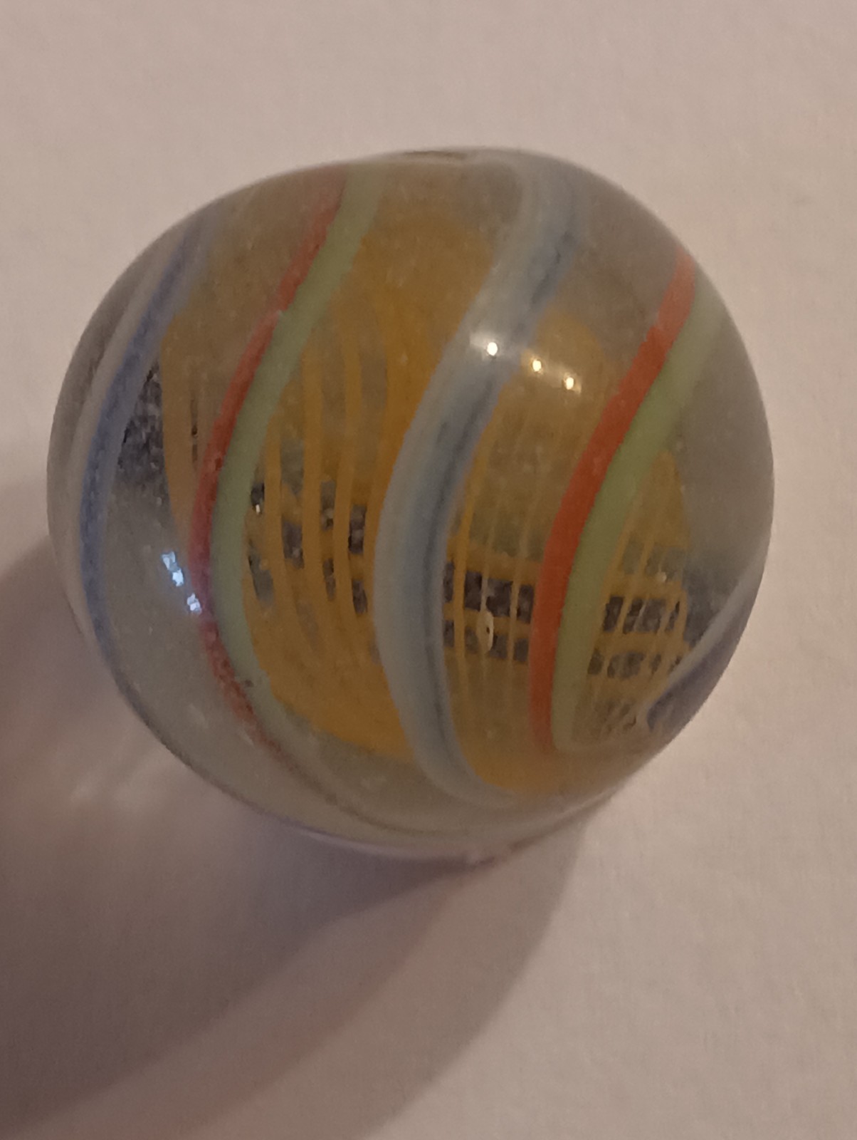 German Latticinio Yellow Core Marble. .74 Inch Blue White / Red Green Stripes