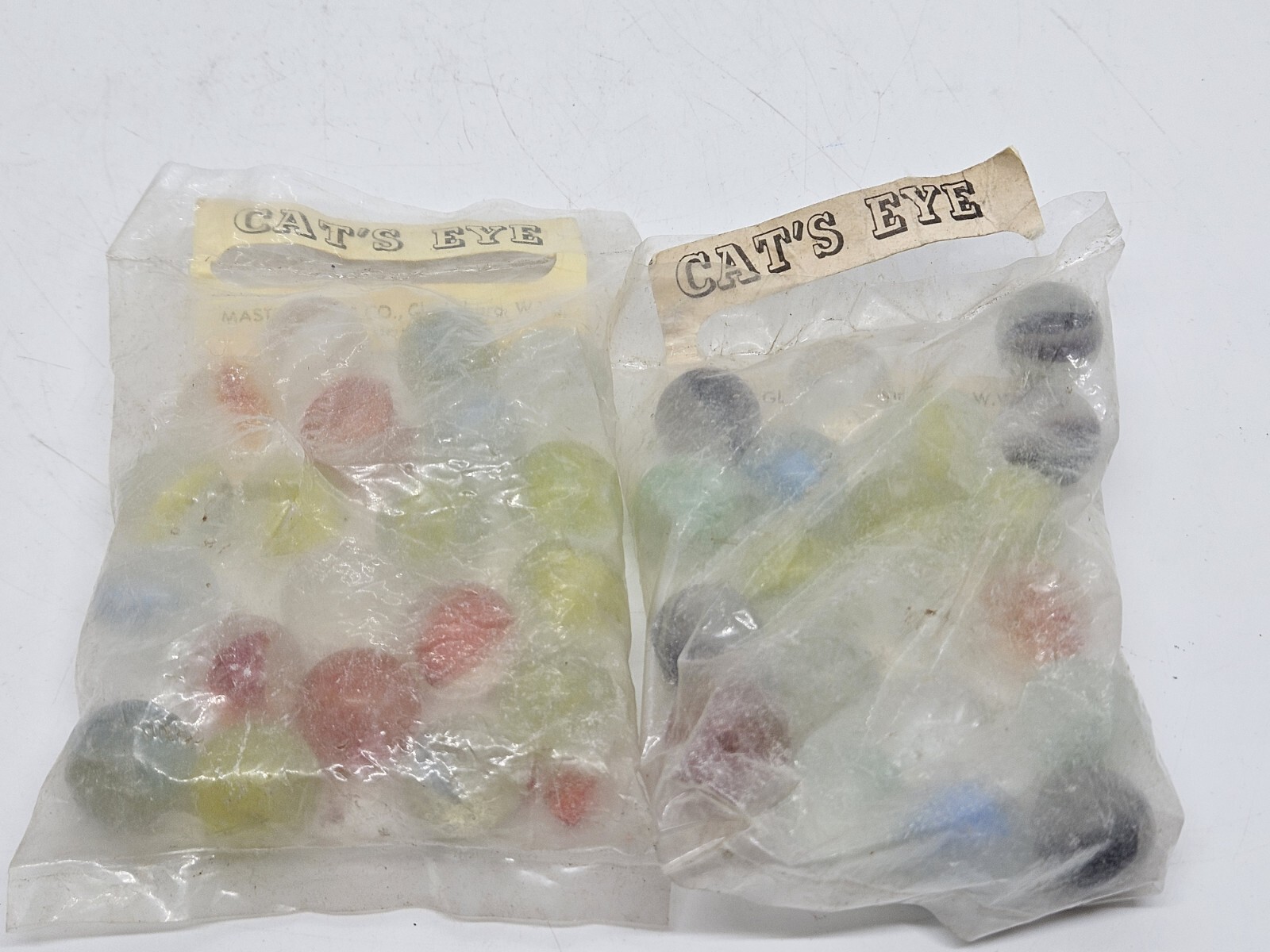 Antique 2 NOS “Cat’s Eye” Marbles Marble Bags Master Glass Co. Clarksburg W. VA.