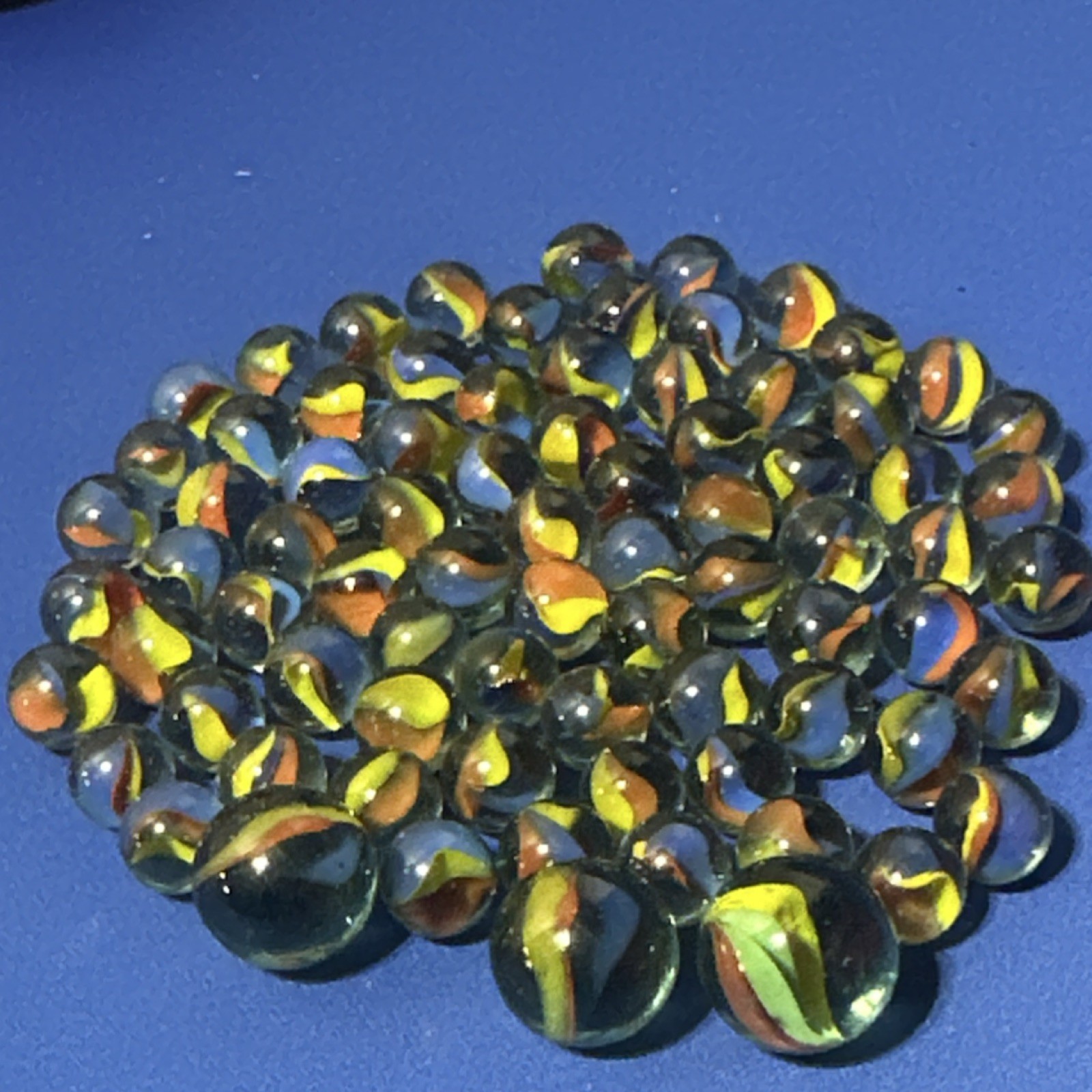Cat’s Eye Glass Toy Marbles Lot Machine . unknown age
