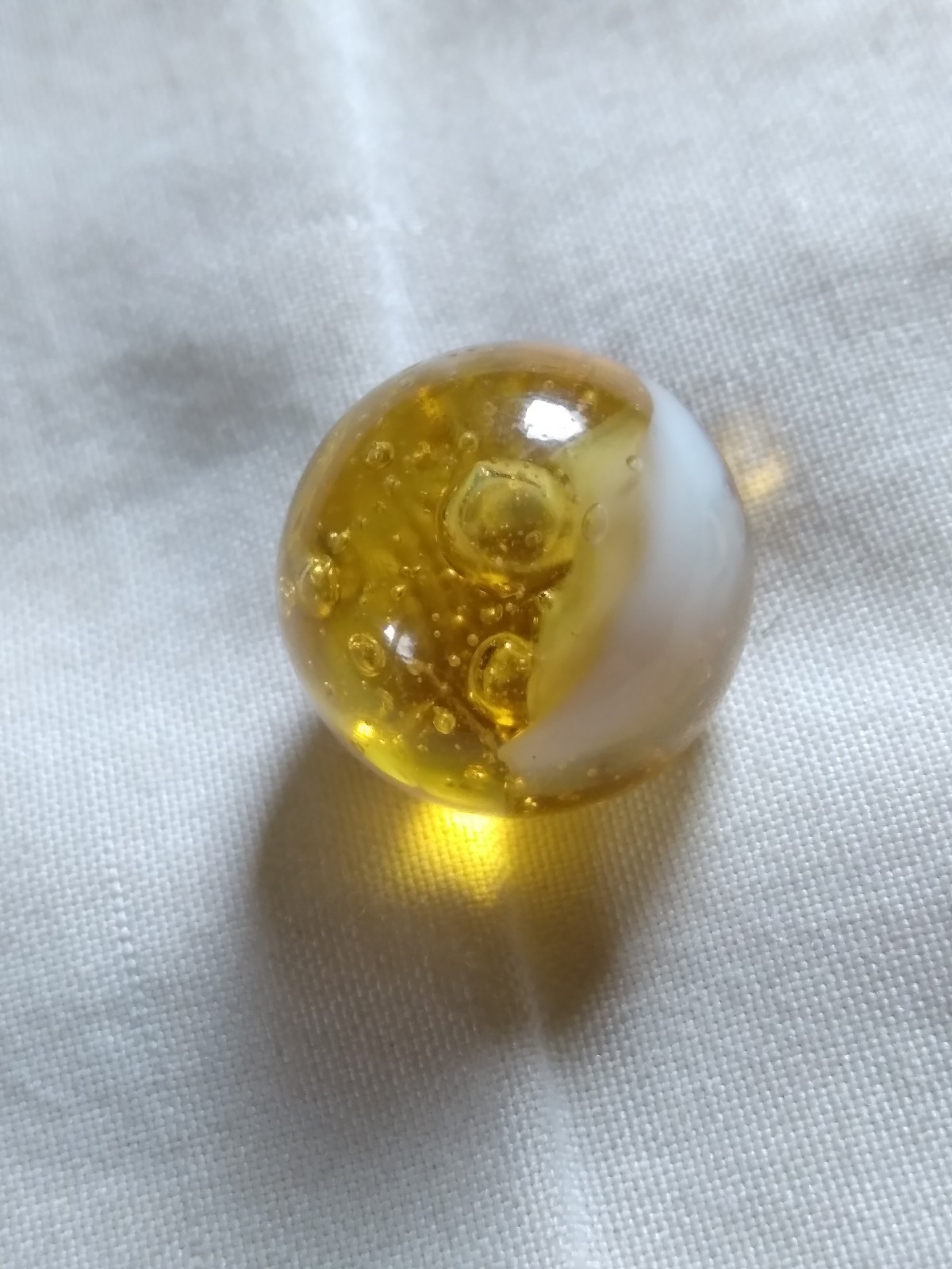 Vintage 9/16″ Yellow Glass Playing Marble.