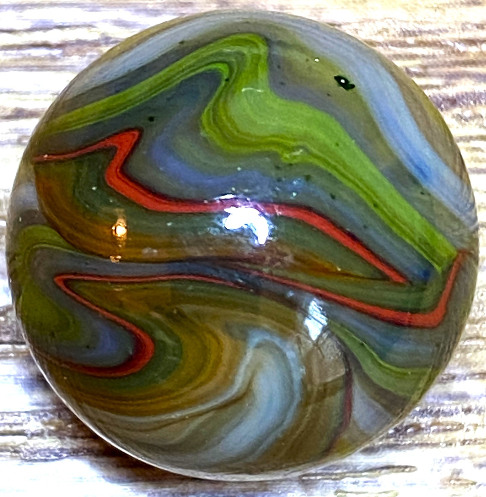 DAS/JABO BEAUTIFUL THIN LINE OXBLOOD MARBLE SWIRLED SHOOTER SIZE .69″ BOX03/233
