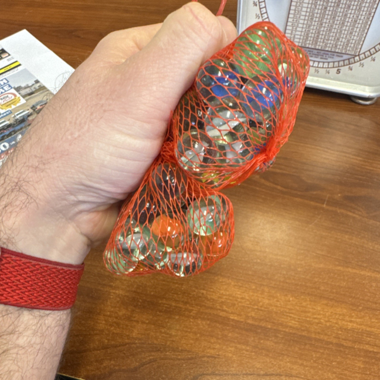 2 bags of Marbles in Red Mesh Bags roughly 3/4 pounds