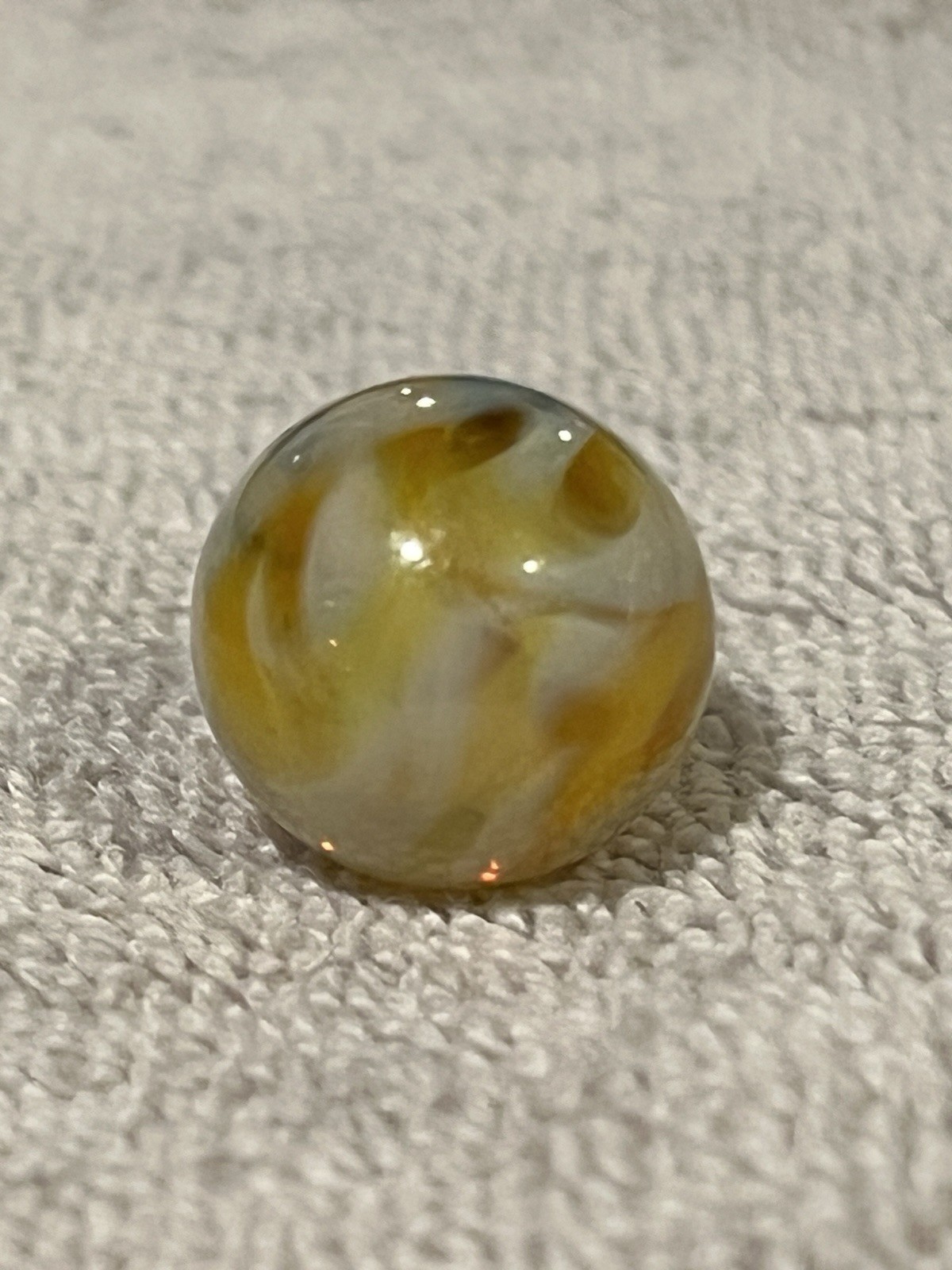 Alley or Champion Yellow Gold Translucent Furnace Swirl .63 Wet Mint