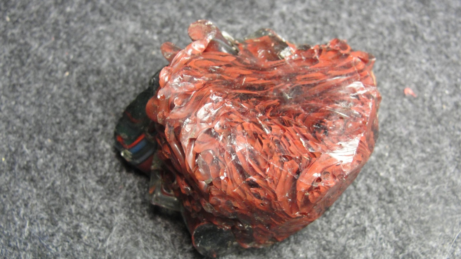 piece of Spaghetti OXBLOOD cullet from a Jabo Joker experimental marble run