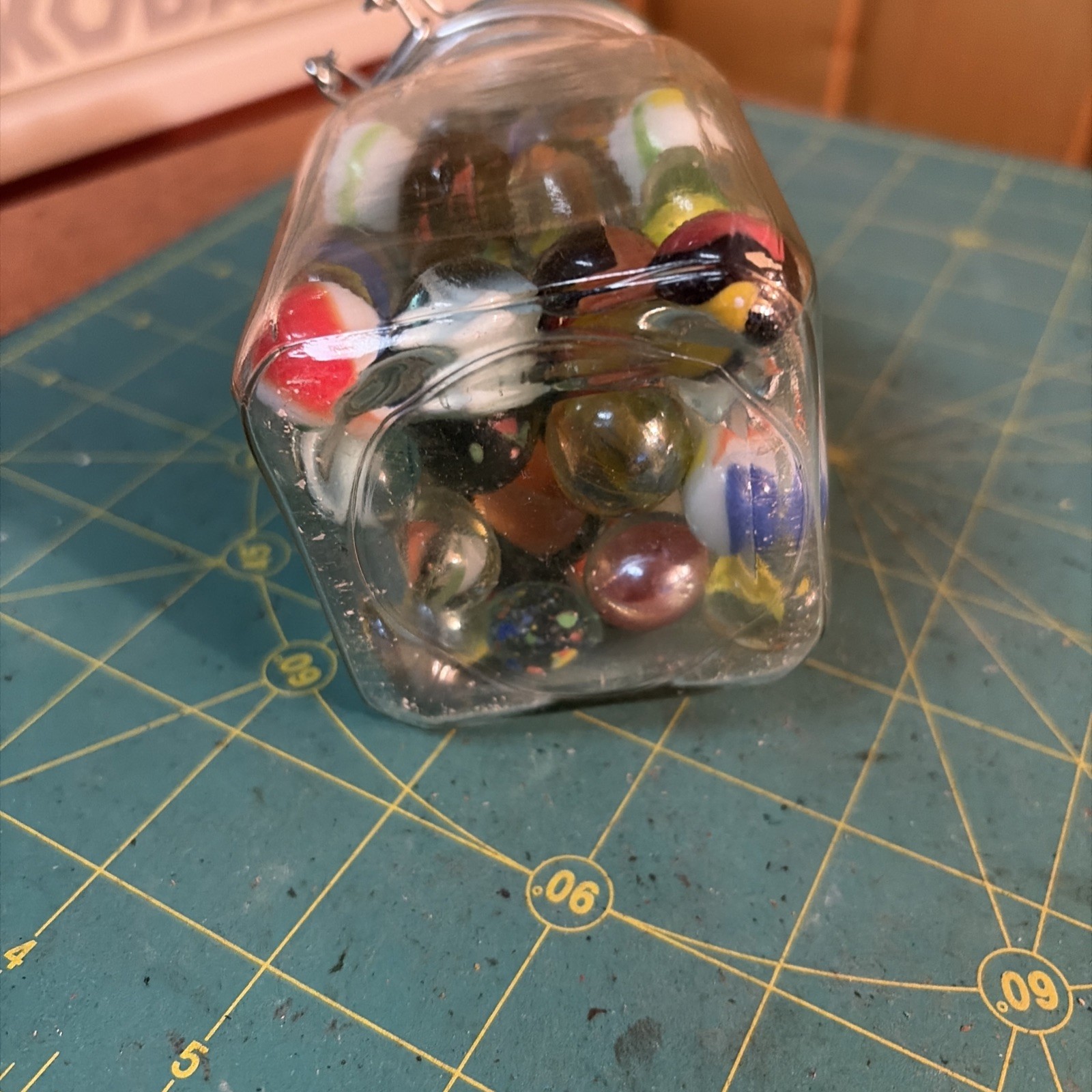 Vintage Set Of 68 Marbles 5” Wire Clasp Jar. Marbles Are Colorful And One Large