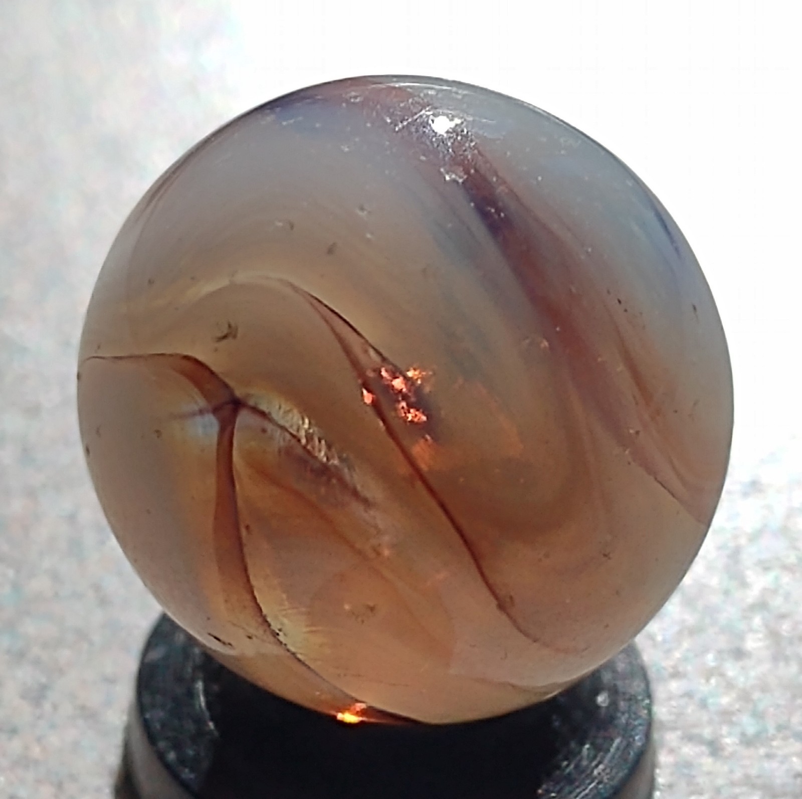 Transluc. Heaton Swirl marble-.64″+or-, OOR-Wispy interior, Purple streaks, N M