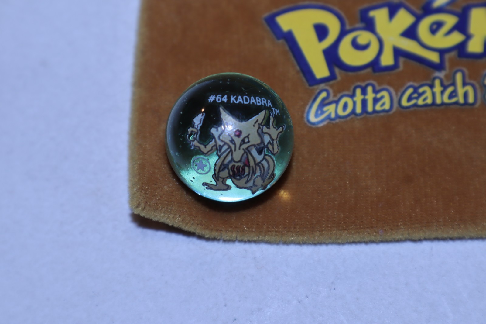 1 Pokémon Collectible Marble #64 Kadabra & Pouch #76 Golem