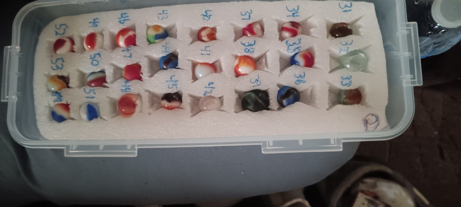 old marbles I dugout of a playground pick a number make offer