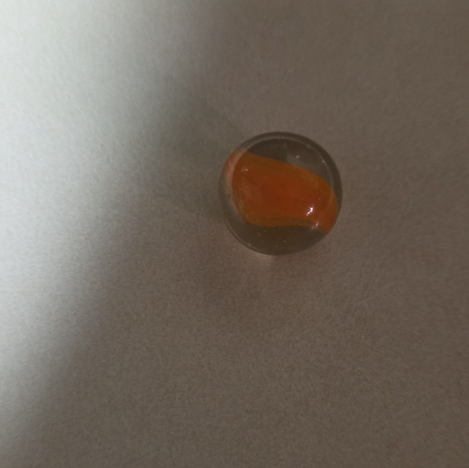 Clear Glass Toy Marble with Orange Swirl Pattern – Age 17 Years & Up
