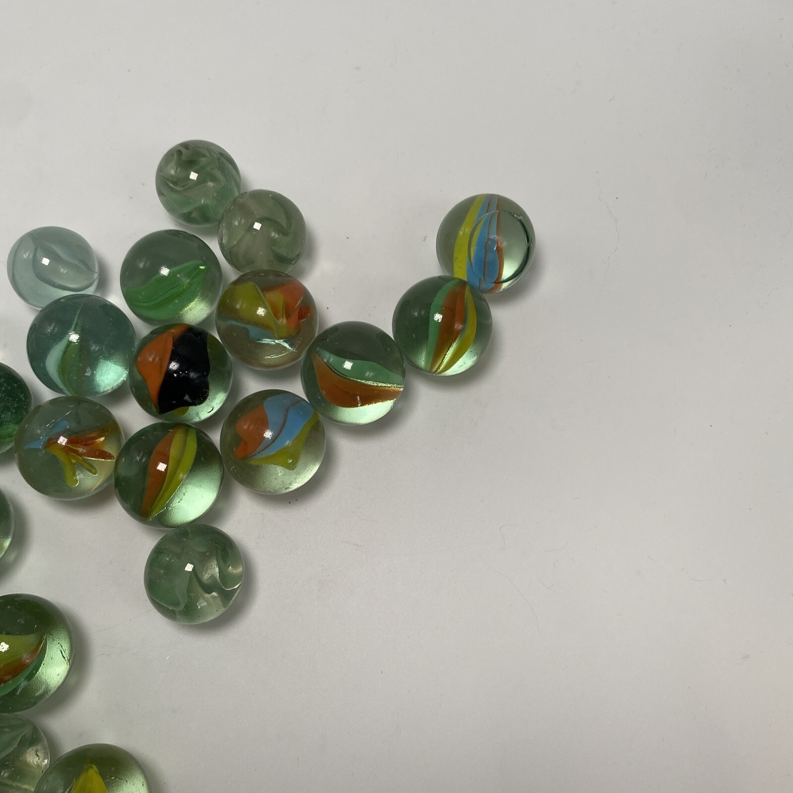 Lot Of 26 Cat’s Eye Glass Marbles Yellow Green Blue Orange White Assorted Sizes