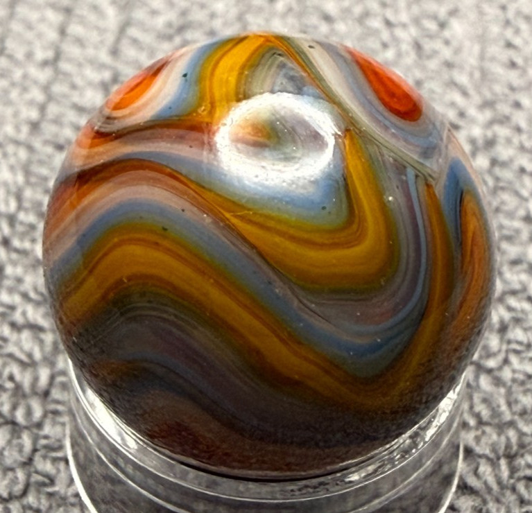 JABO / DAS .63″ Mint UV Glows Oxblood Orange Blue Yellow Swirl Marble (274)