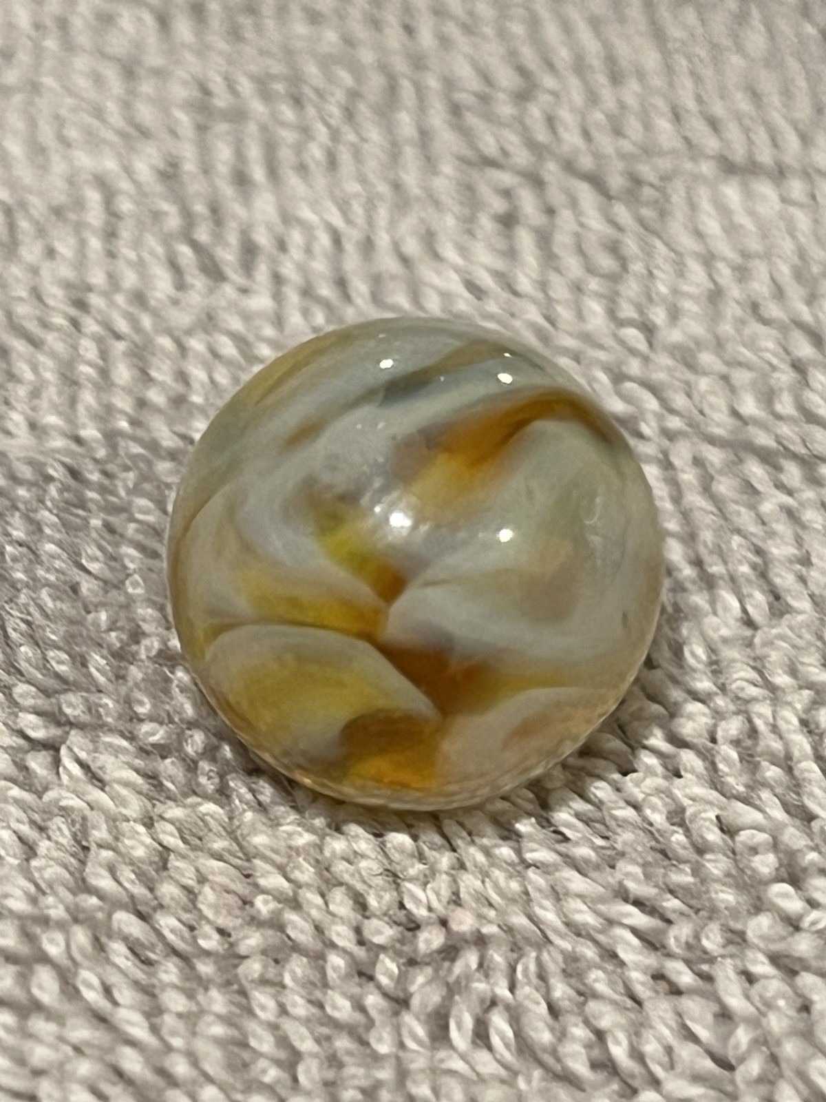 Alley or Champion Yellow Gold Translucent Furnace Swirl .63 Wet Mint