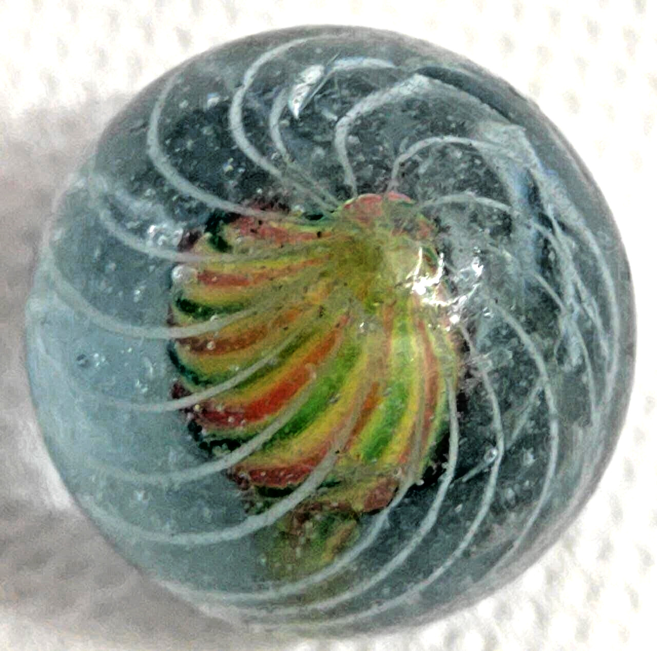 OLD 2 TOY MARBLES multi colored solid core caged 1 tri level ,2 blue base glass