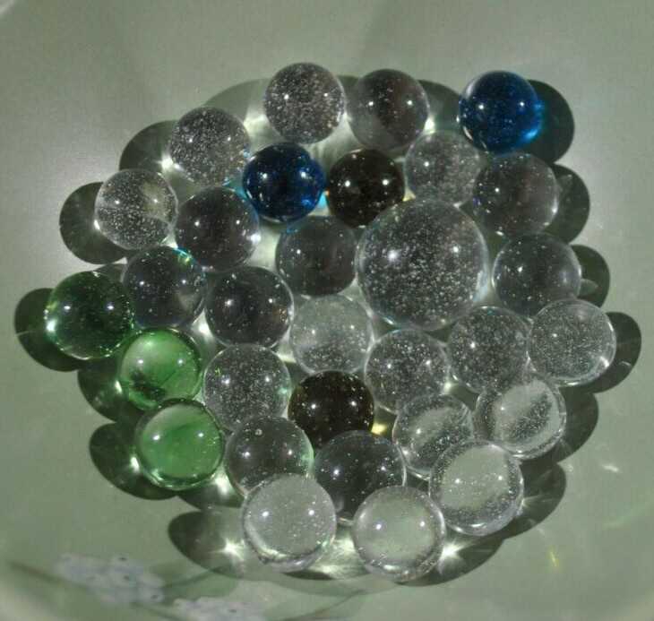Lot of 31 Vintage Clear & a few other colors w/Bubbles Glass Marbles