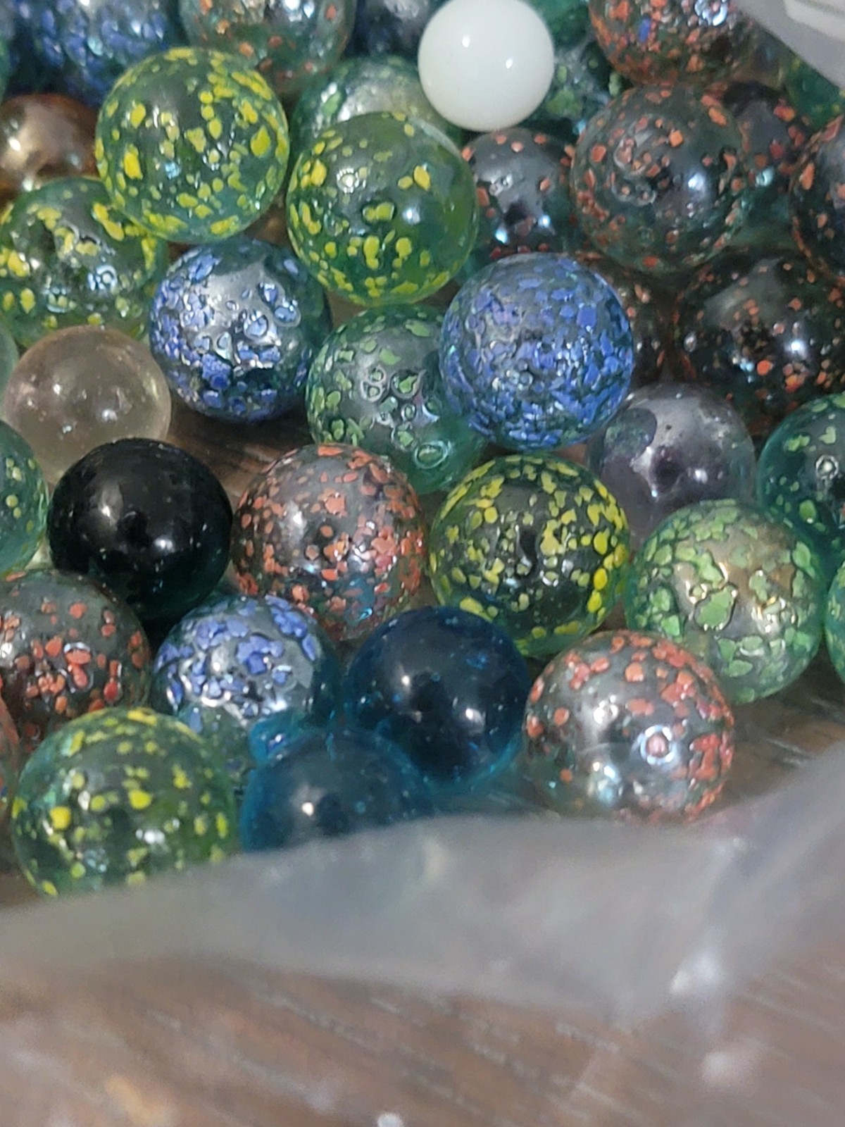 Bag Of Glass Marbles; Different Colors And Some Sizes