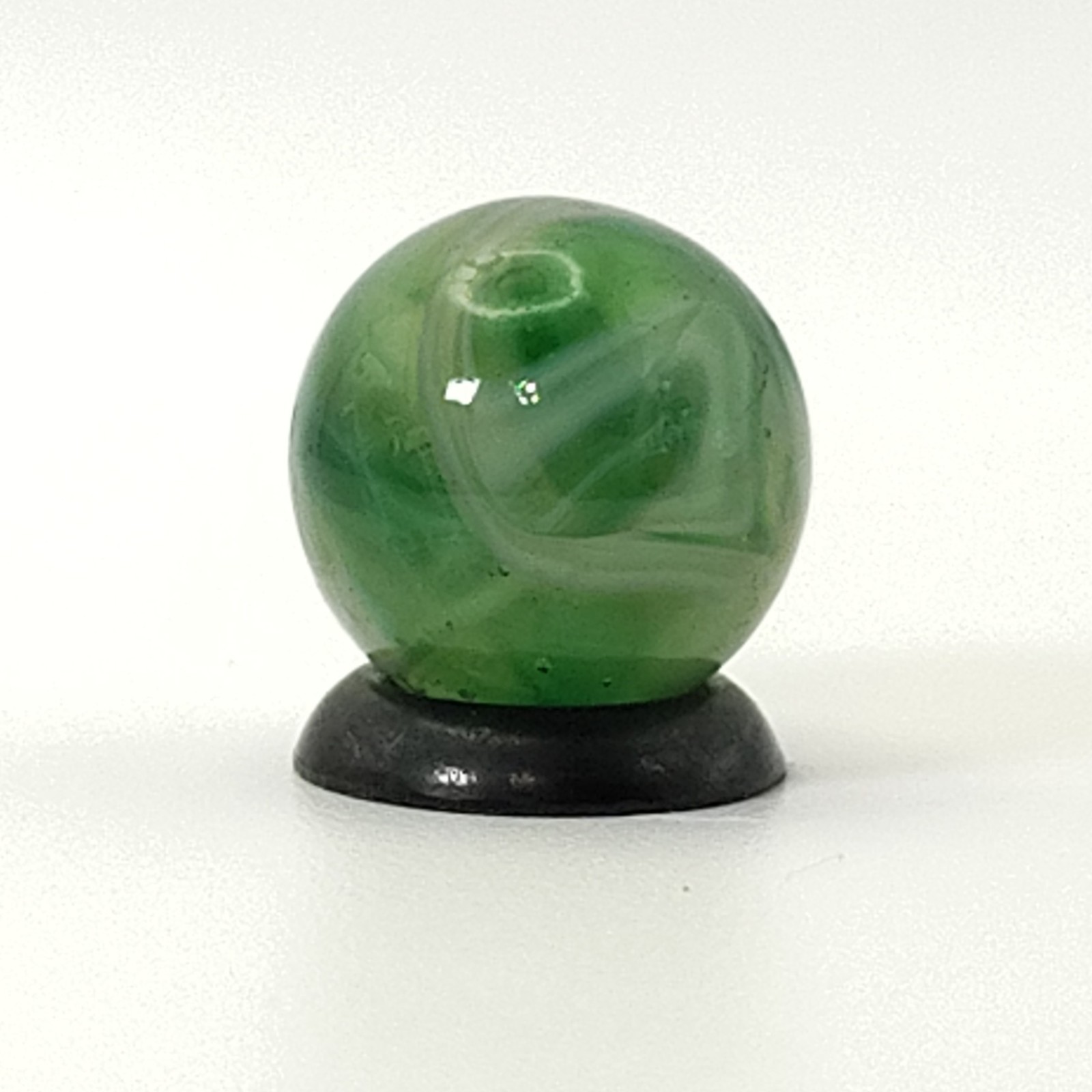 9/16″ Swirl Marble green transparent base w/white & tan ribbons great backlit NM