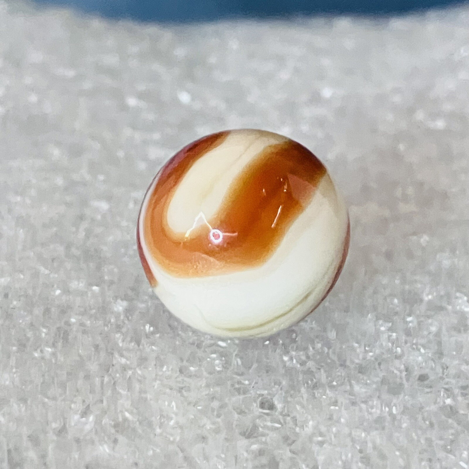 UV Active Ravenswood “R” Swirl Marble .60″ NM Wet Red / Blood On White Red Raven