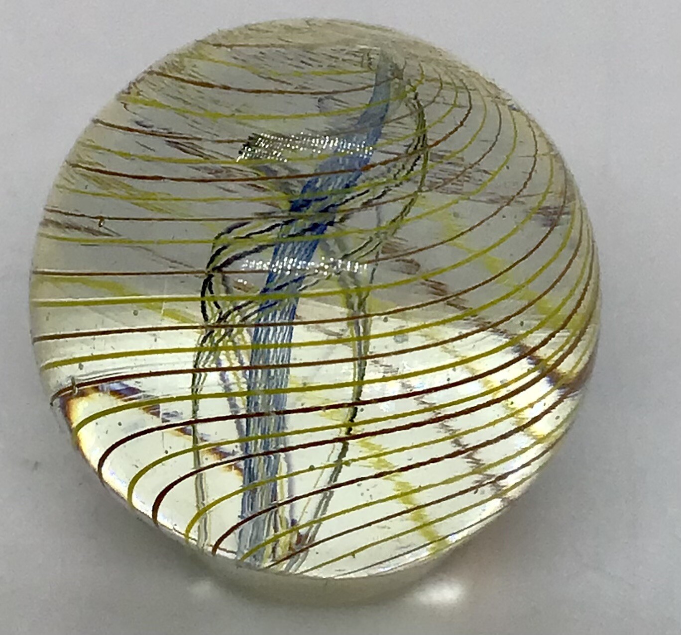 Contemporary Divided Ribbon core marble. It measures .88” in mint condition.