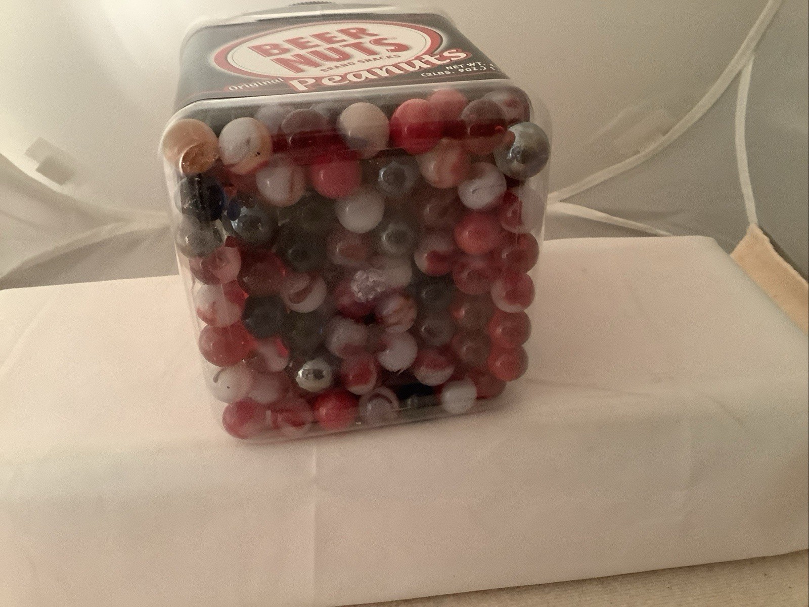 Plastic Bottle filled With A Mixture Of Marbles Found In A Garage.