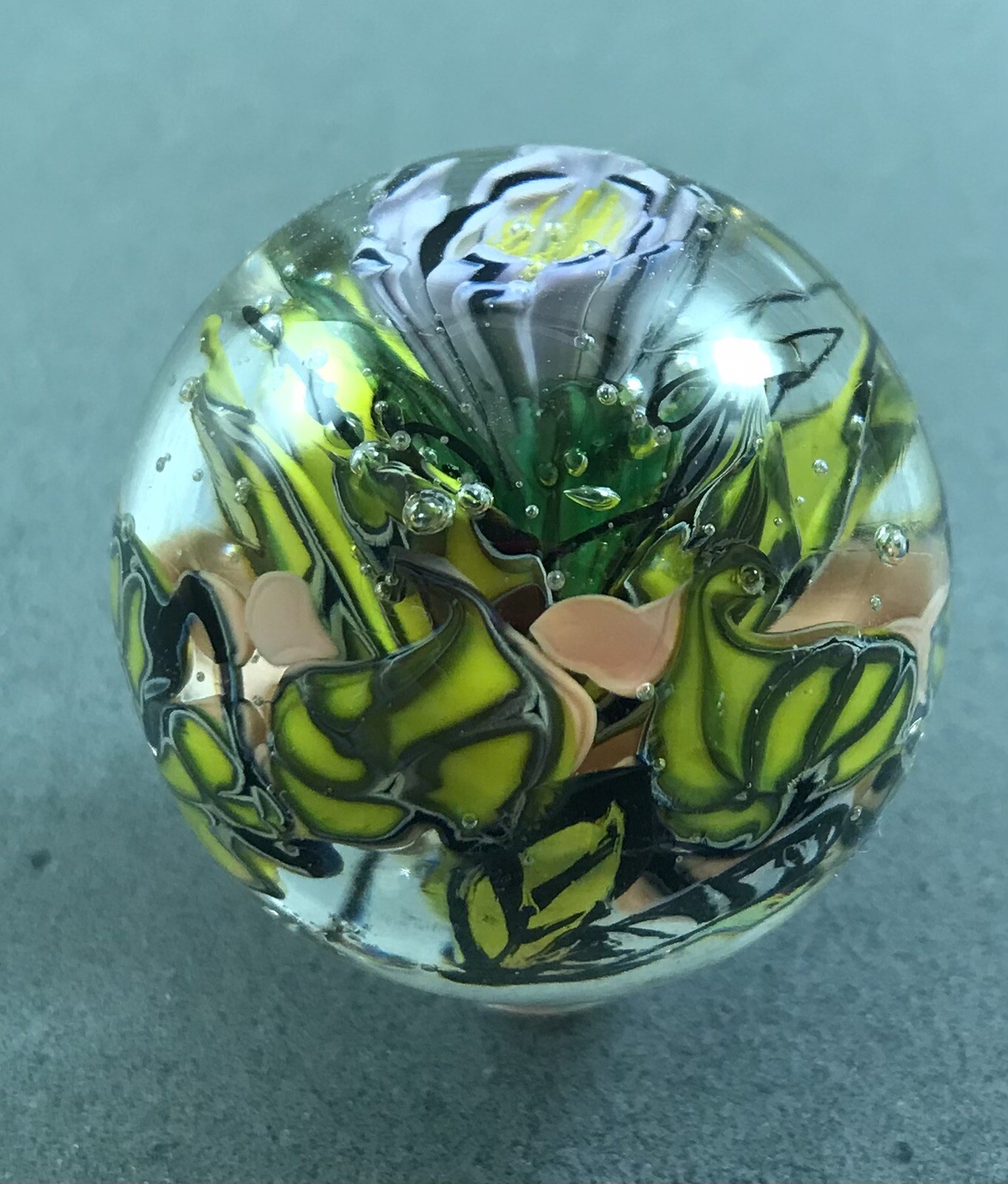 handmade 1 3/4” Purple Murrini Floral glass marble W/ Hand Painted Bug