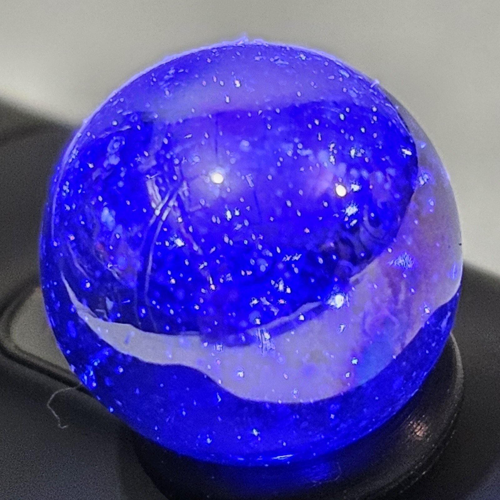 Iridescent Marble Unknown Maker .60 Inch Carnival Marble Blue Base