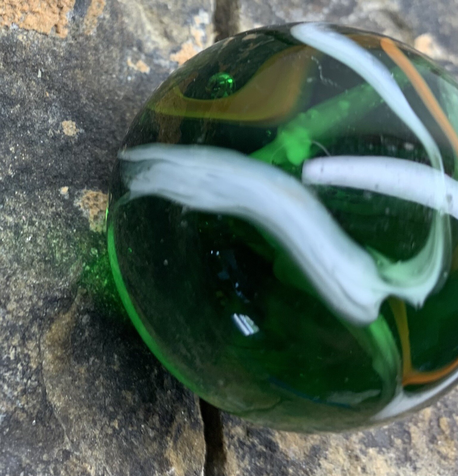 Glass Marble 1.5” In Diameter. Used. Green With Swirls