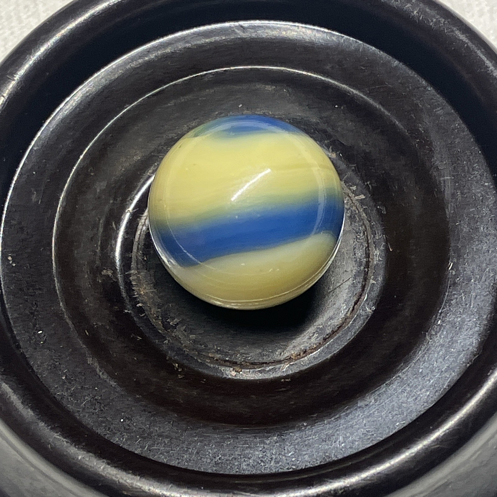 Vintage Akro Agate Corkscrew swirl banana yellow ocean blue glass marble wet