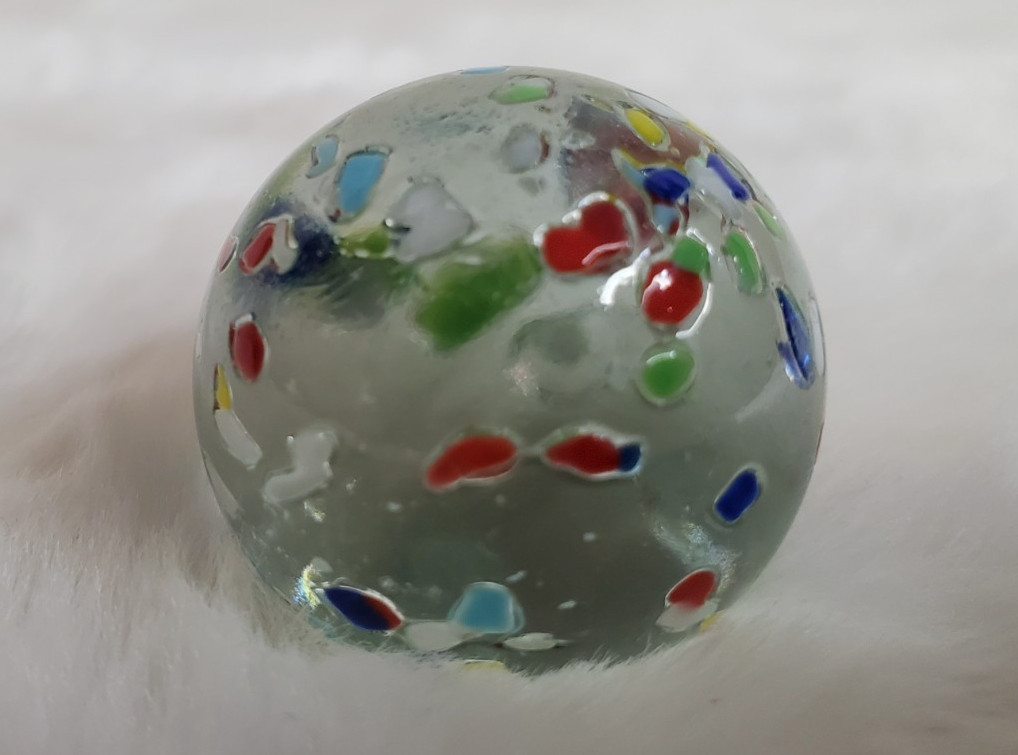 1″ Vintage confetti shooter marble – clear glass w/ multi colors on surface