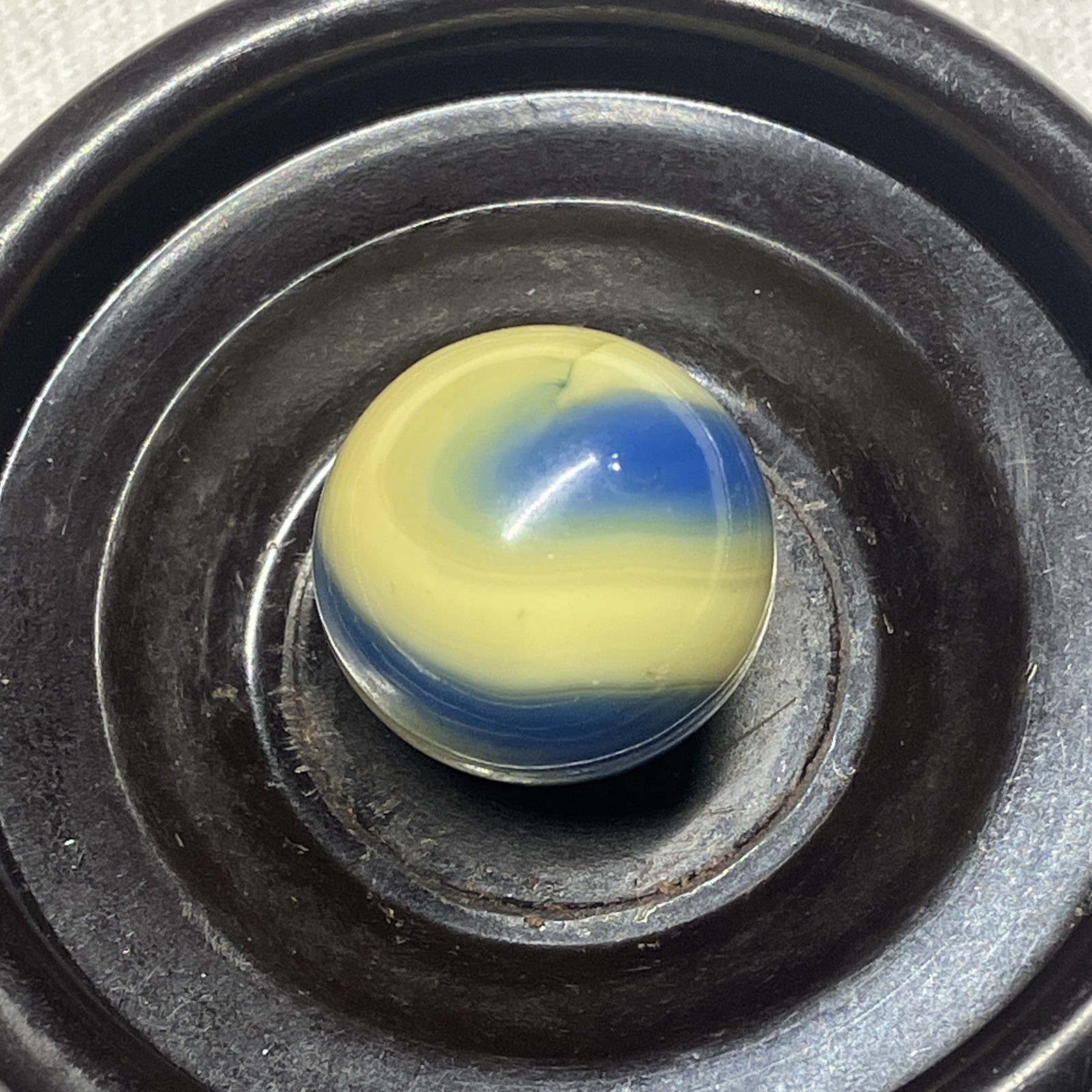 Vintage Akro Agate Corkscrew swirl banana yellow ocean blue glass marble wet