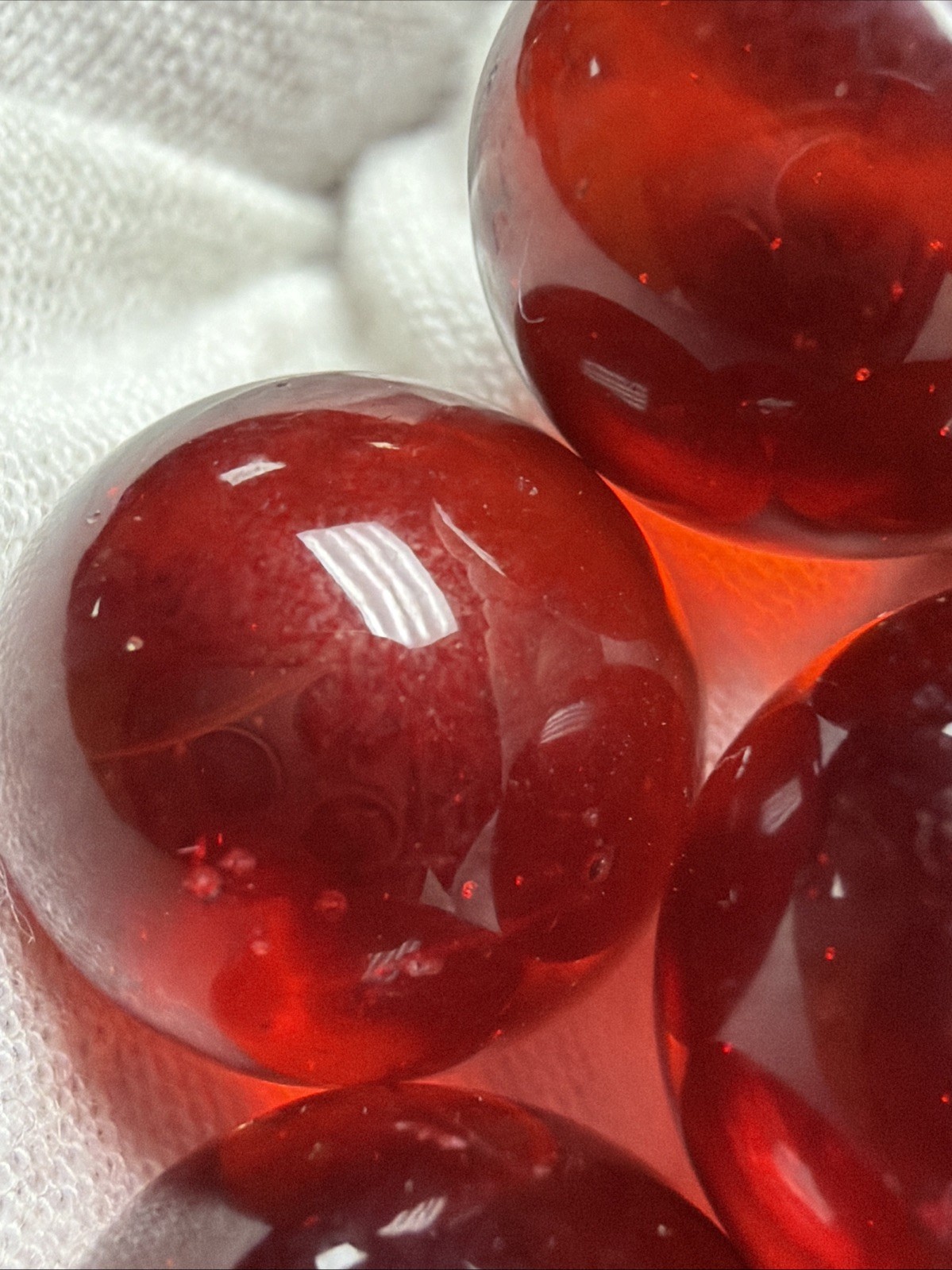 Vintage Lot of 4 Clear Ruby Red Cadmium Slag Glass Marbles UV Reactive As Is